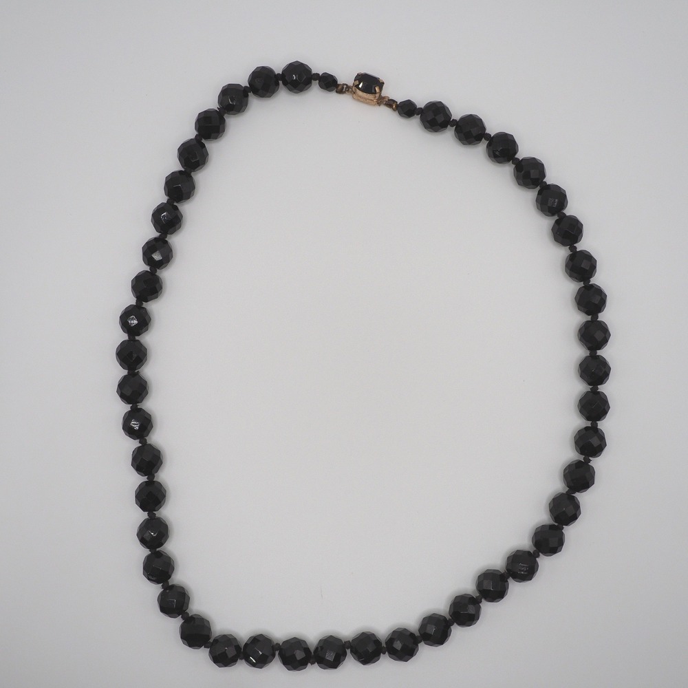 Vintage Necklace Black Faceted Glass Bead 22" Knotted Gold Tone Decorative Clasp